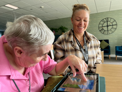 Paula and Kim using the iPad