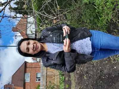 Lamyai Holt holding her award